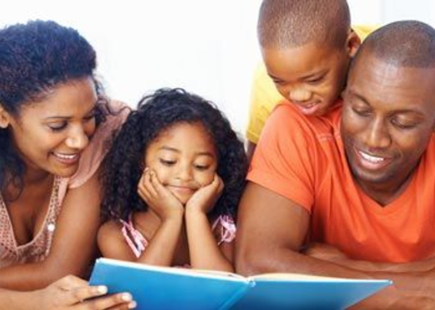 parents reading with child